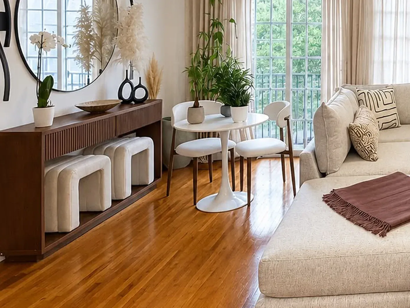 Open living and dining area with round dining table